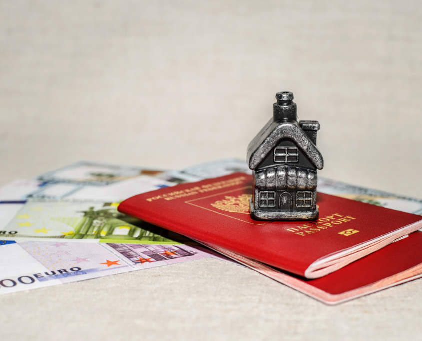 Passport, money and home - the concept of buying a property